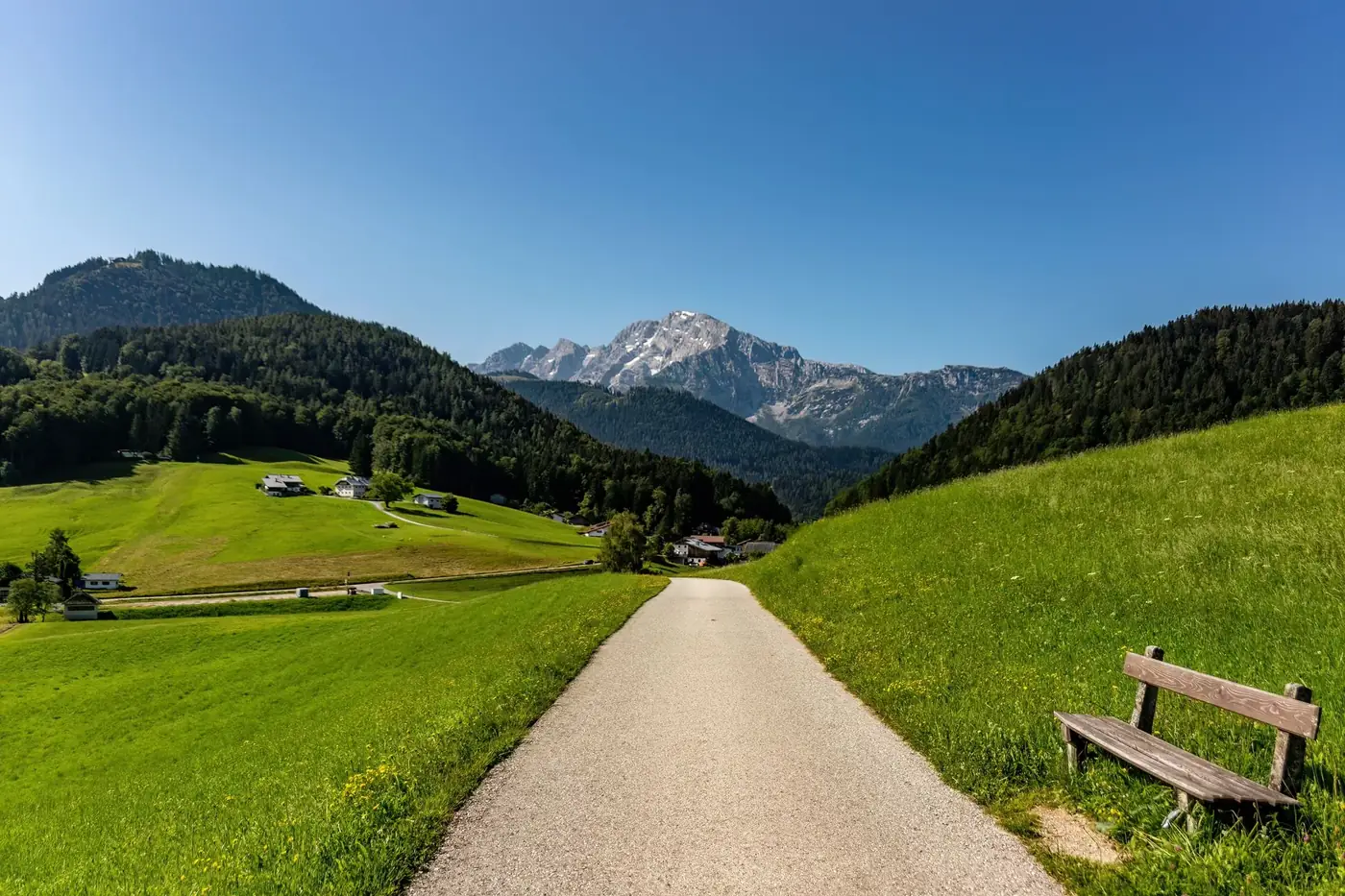 Enjoy a serene hike on a scenic trail in Bad Dürrnberg, Salzburg, Austria with mountain views.