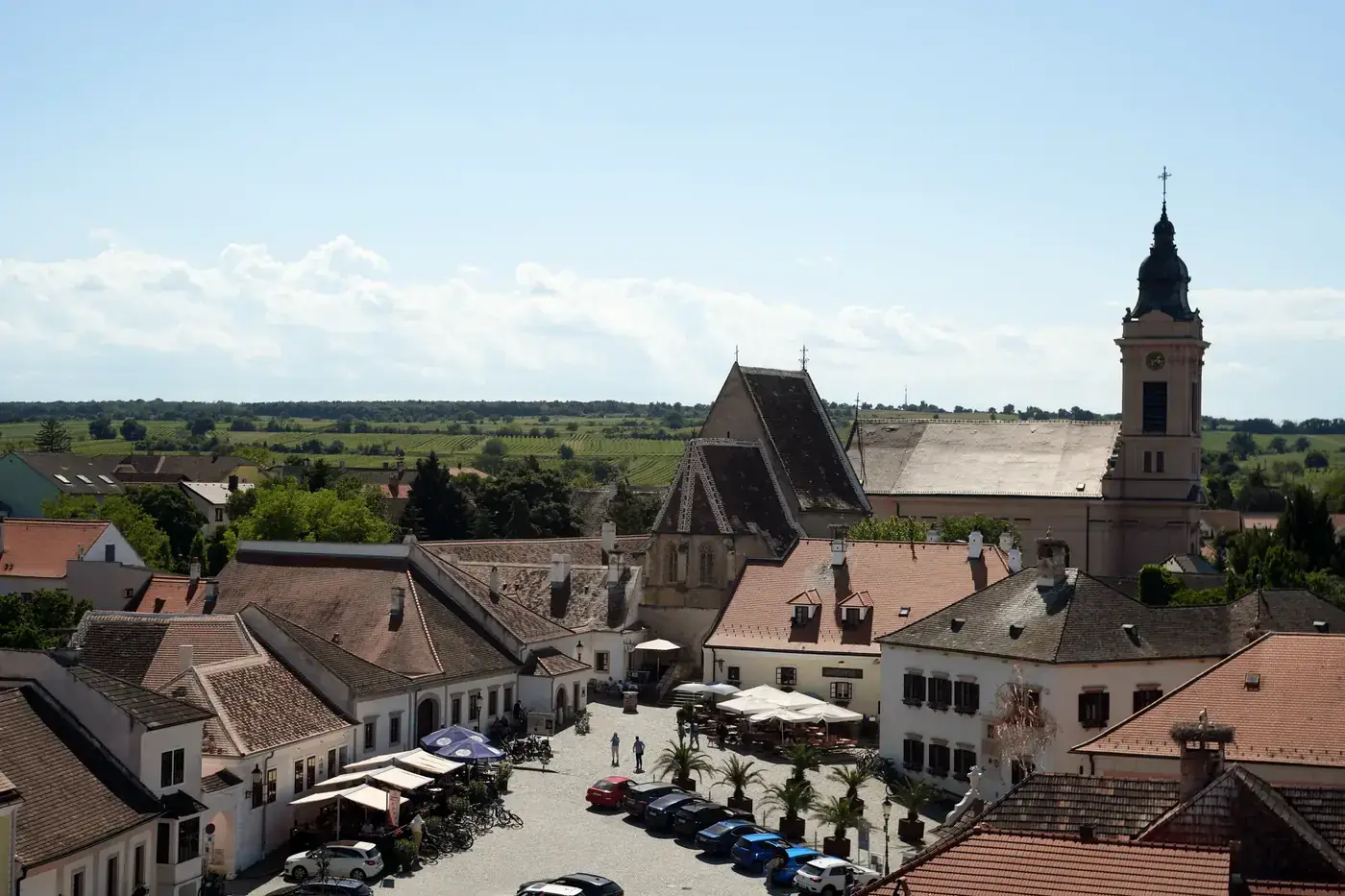 Aerial view of a charming village in Burgenland, Austria, showcasing architecture and countryside beauty.